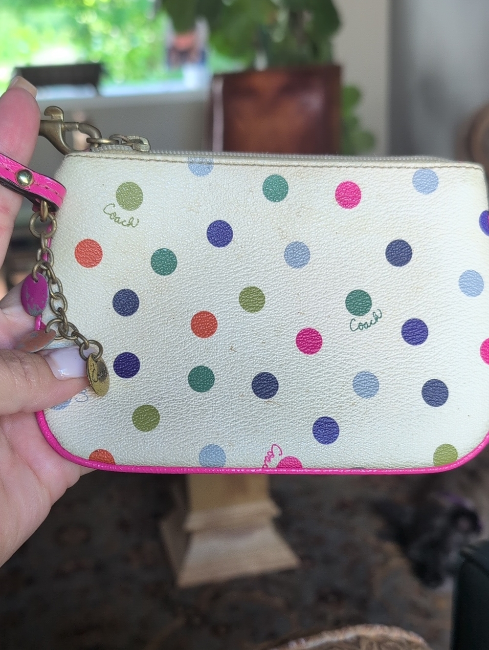 Coach Vintage Cream Polka Dot Wristlet with Pink Trim.